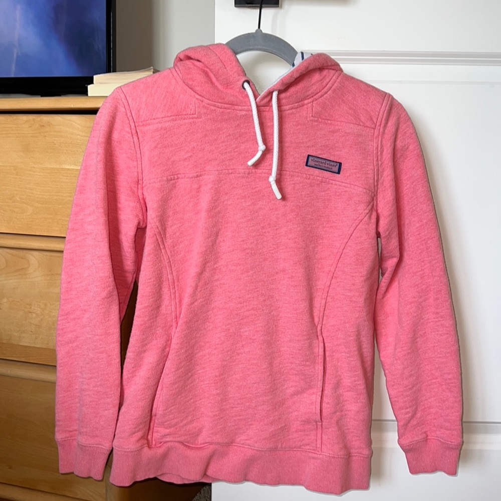 Light Pink Vineyard Vines Hoodie. Inside of the hoodie is white and blue stripes